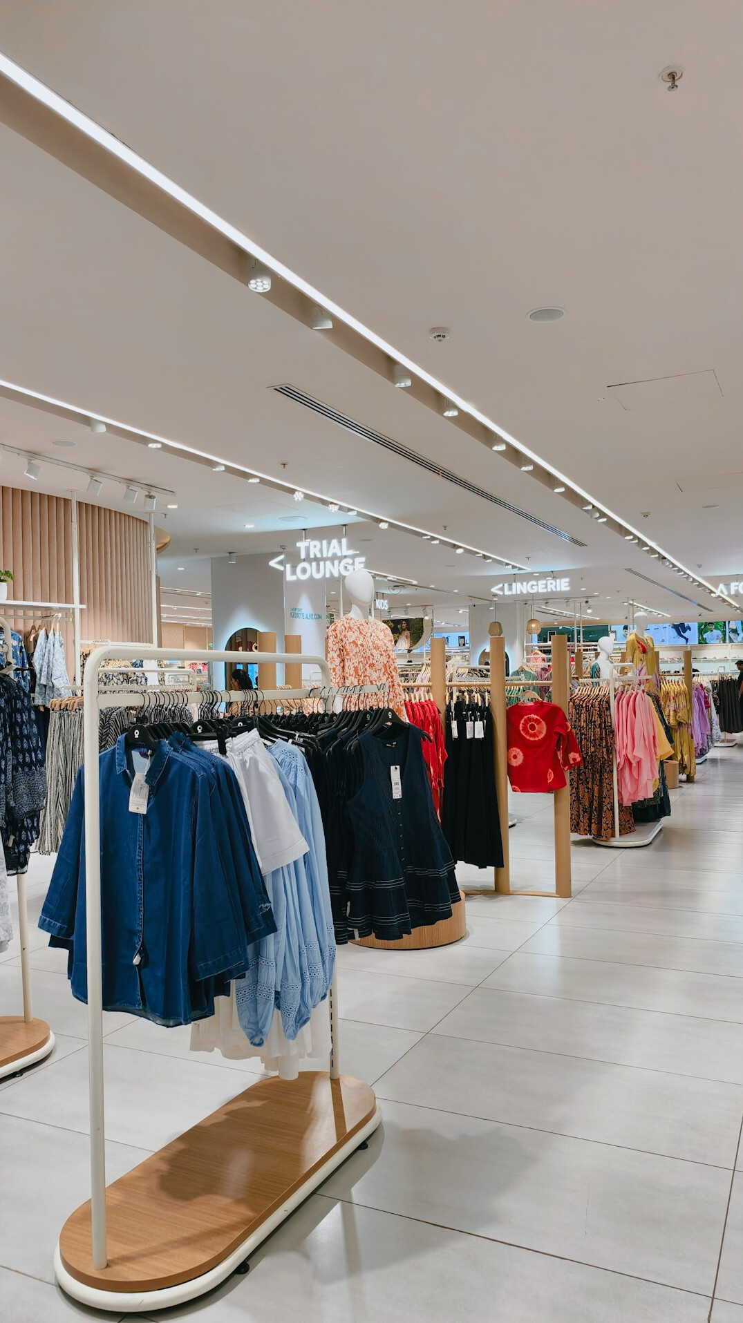 Clothing rails and displays inside a fashion store